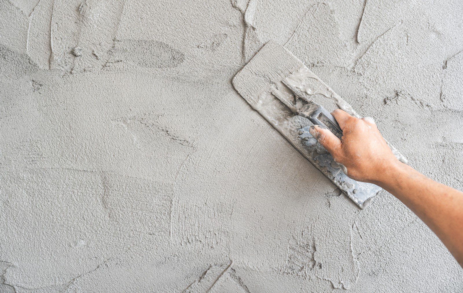 Hand Worker Plastering With Trowel Handle Wet Grey 2024 03 11 20 45 36 Utc